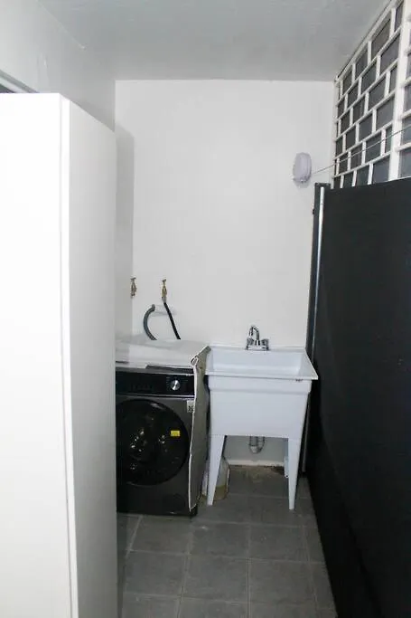Minimalist Studio Near Devon House Kingston